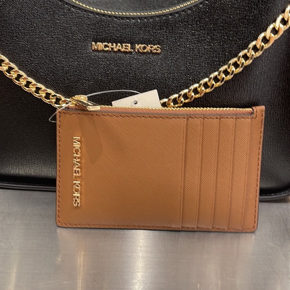 MICHAEL KORS
Jet Set Travel Medium Top Zip Leather Card Case Wallet 
Luggage
NWT - Picture 11 of 16